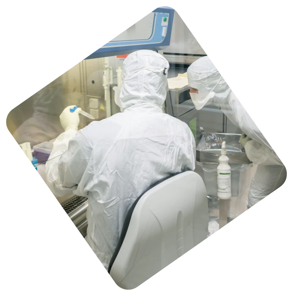 Image of two people looking at samples that could be labeled with sterile labels